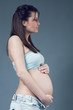 Beautiful pregnant white woman hands on belly Beautiful pregnant white woman hands on belly