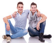 Photo: two friends smiling to the camera two friends smiling to the camera