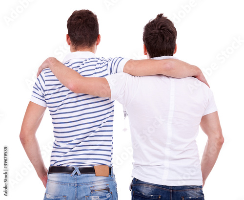 Photo: back view of two friends back view of two friends