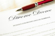 Photo: closeup of a divorce decree document with pen closeup of a divorce decree document with pen