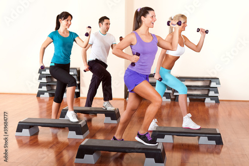 Photo: step aerobics with dumbbells step aerobics with dumbbells