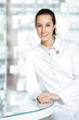 Photo: portrait of a female pharmacist at pharmacy portrait of a female pharmacist at pharmacy