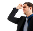 Businessman looking frustrated from work