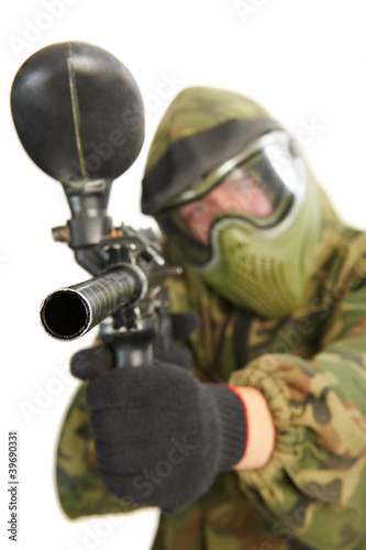 Photo: Aiming paintball player Aiming paintball player