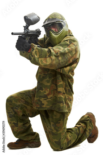 Photo: Aiming paintball player Aiming paintball player