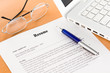Resume with Pen by Laptop