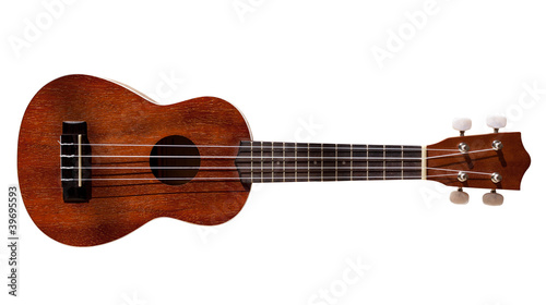 Photo: Hawaiian ukulele guitar with four strings isolated on white Hawaiian ukulele guitar with four strings isolated on white