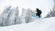 Foto: snowboarder on fresh deep snow snowboarder on fresh deep snow