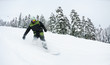 Foto: snowboarder on fresh deep snow snowboarder on fresh deep snow