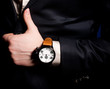 Photo: Beautiful masculine hand with a clock Beautiful masculine hand with a clock