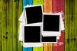 Blank Photos on Multicolored Wood Plank Background
