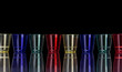 Photo: Colored plastic glasses on black Colored plastic glasses on black