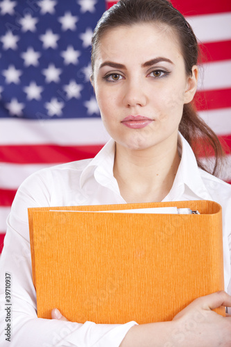 Photo: student over american flag student over american flag