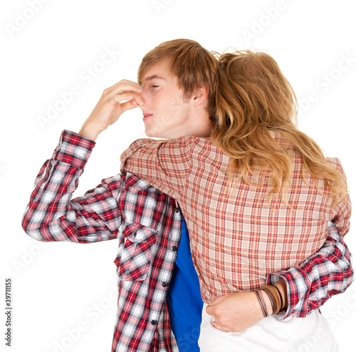 Photo: hugging woman and man, she smells hideously hugging woman and man, she smells hideously