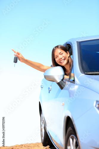 Photo: Car woman showing keys Car woman showing keys