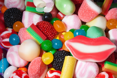 Photo: Candy assortment background Candy assortment background