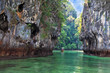 The Thai boat swims in a bay The Thai boat swims in a bay