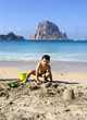 Child playing at the beach