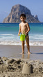 Child playing at the beach