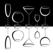 Black and white glasses of alcohol drinks