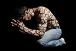 Foto: Cracked skin man in pose Cracked skin man in pose