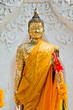 Foto: Golden standing Buddha statue Golden standing Buddha statue