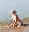 Photo: Woman in white hat Woman in white hat