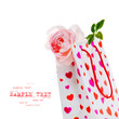 White gift bag with heart pattern  and  pink rose on white backg