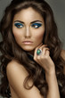 Foto: Woman with bright makeup Woman with bright makeup