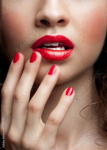 Photo: Closeup of woman red lips Closeup of woman red lips