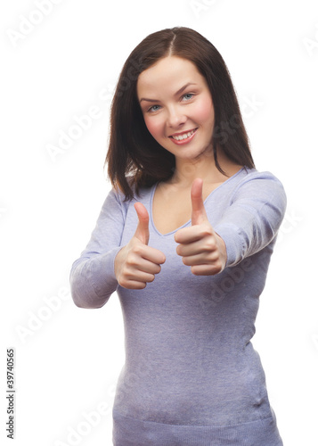 Photo: Girl showing thumb up Girl showing thumb up