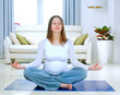 Beautiful Pregnant Woman Doing Yoga at Home