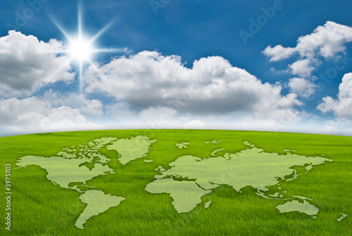 Illustration: World map on grass field and blue sky. World map on grass field and blue sky.