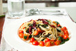 Spagetti with tomatoes and Thai herbs