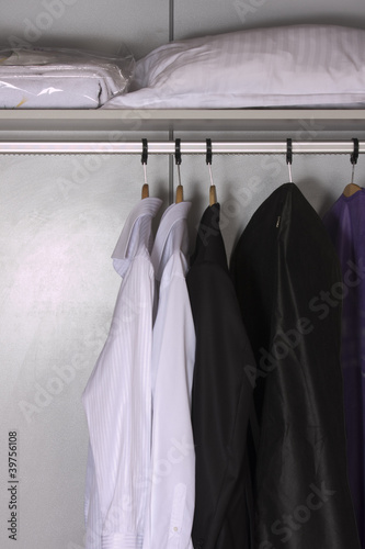Photo: modern wardrobe with clothes modern wardrobe with clothes