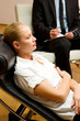 psychiatrist examining a female patient
