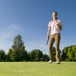 Foto: gutgelaunte Golferin gutgelaunte Golferin