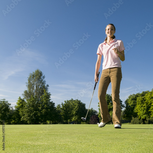 Foto: gutgelaunte Golferin gutgelaunte Golferin