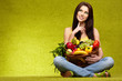 Photo: Happy young woman with vegetables. Happy young woman with vegetables.