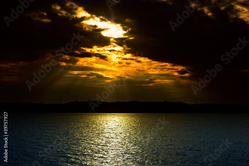 Photo: Dramatic skies over the sea surface Dramatic skies over the sea surface