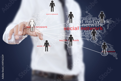 Photo: Businessman pushing people Social Network. Businessman pushing people Social Network.