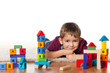 Little boy on the floor near toys Little boy on the floor near toys