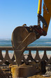 Excavator next to the beach