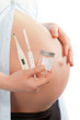 Photo: Pregnant woman with medical equioment for health check, focus on Pregnant woman with medical equioment for health check, focus on