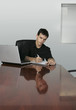 business man in office writing