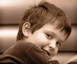 young boy looking at camera