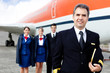 Airplane captain with crew