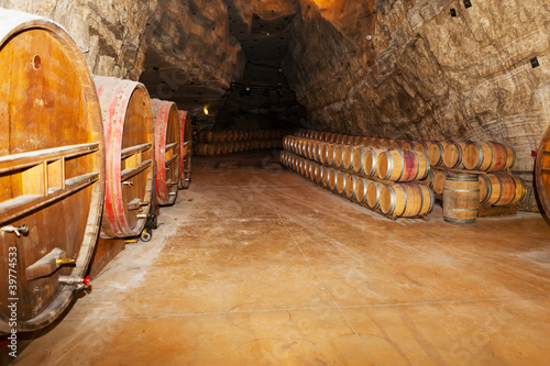 Photo: wine barrels in a winery, France wine barrels in a winery, France