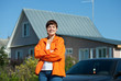 Happy woman in front of her residence Happy woman in front of her residence