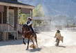 Sheriff drags a Bandit by rope at Mini Hollywood